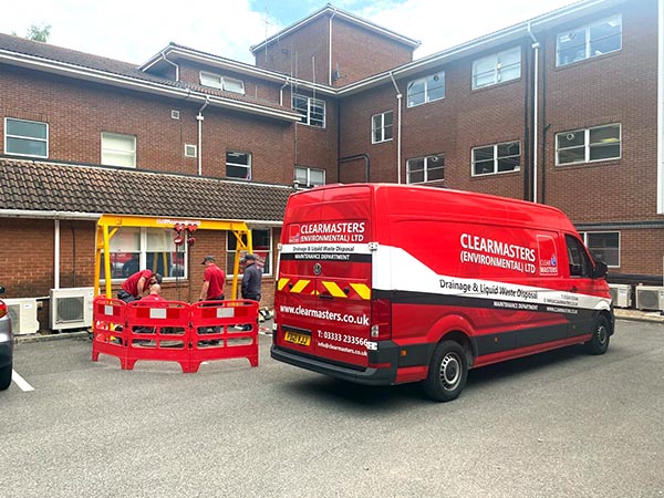 Clearmasters engineers and vans at work on a commercial site