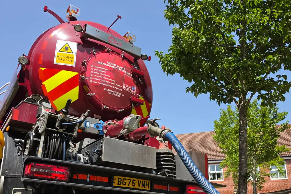 A Clearmasters tanker emptying a septic tank
